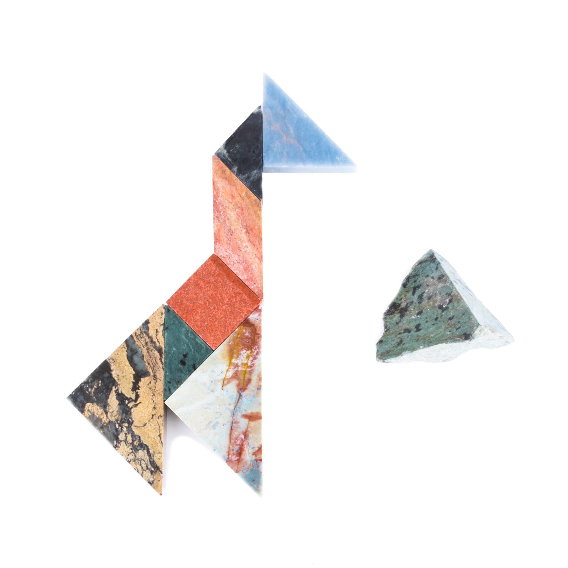 Colorful geometric puzzle pieces on a white background