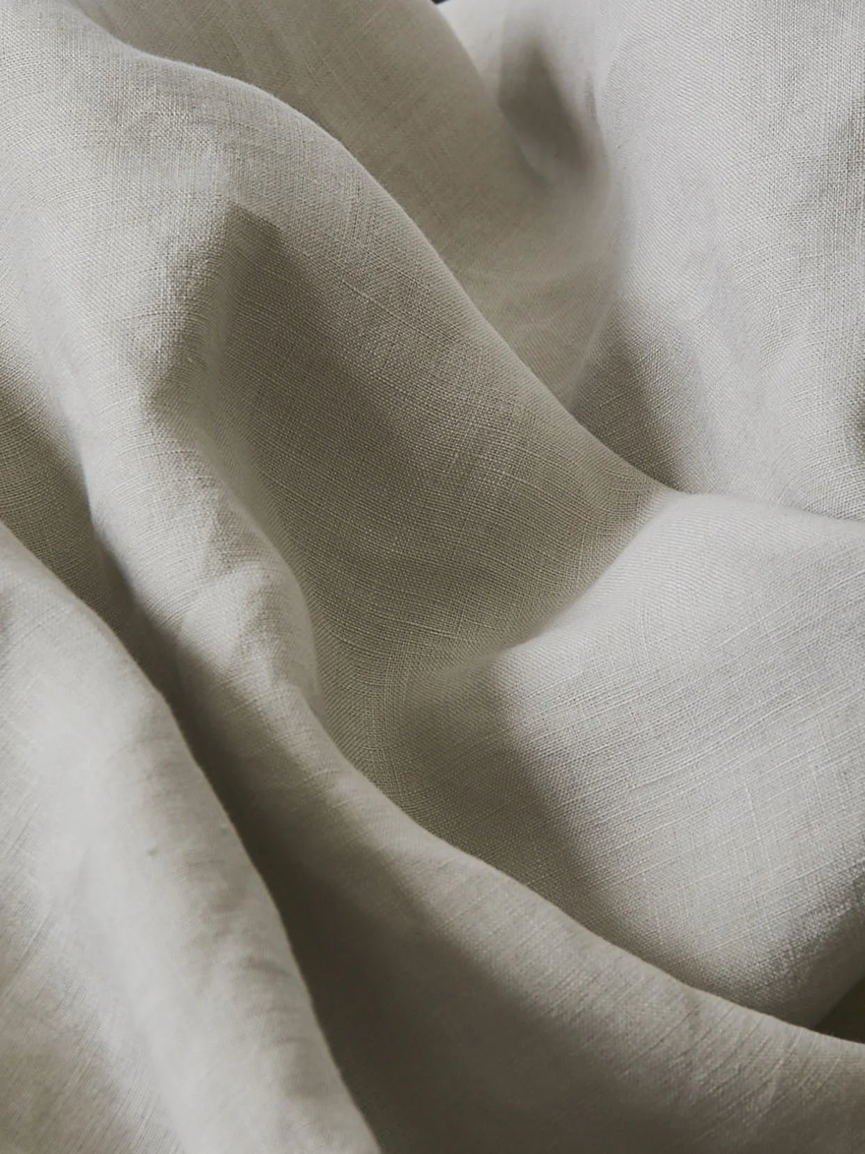 Close-up of beige fabric with visible texture